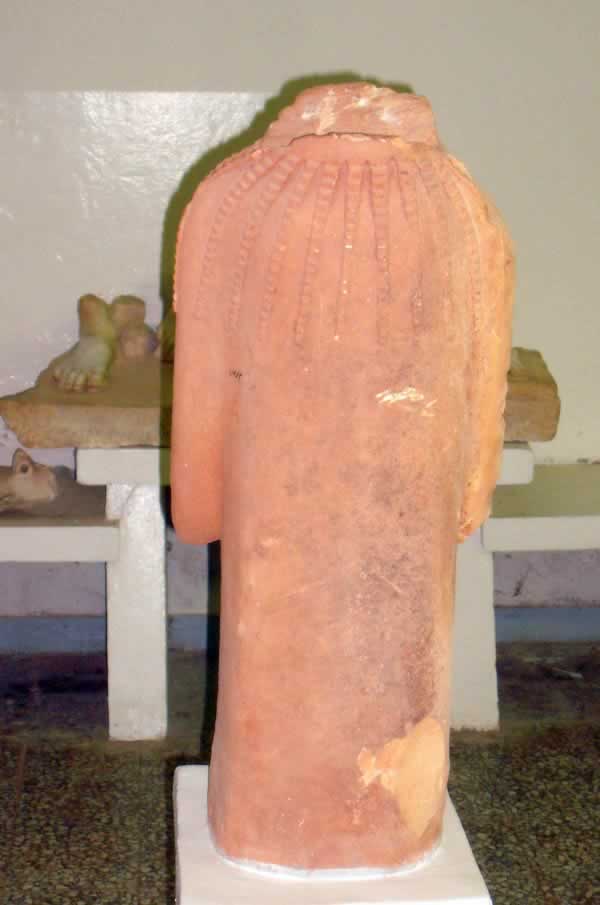 terracotta-like headless statue