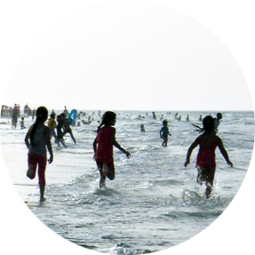 children playing in the sea