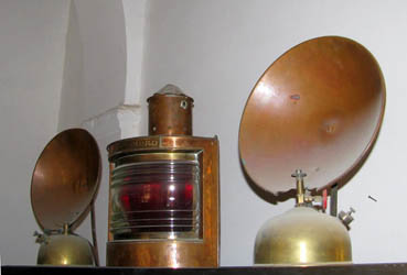 vintage copper and brass heaters and lights