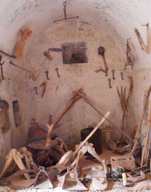 Qaser Alhaj interior showing wooden, stone and metal tools