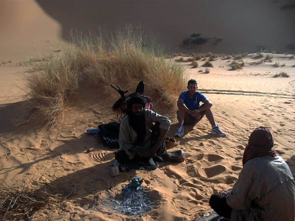 desert guides around a fire