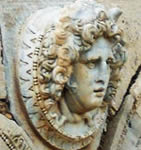 Medusa or gorgon's head looking right