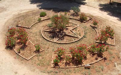 a garden in Qasr Libya in the shape of a ring with a star in the middle