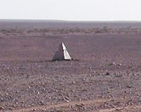 tiny stone pyramids along the desert routes in Libya left by the Italians as markers for safety.
