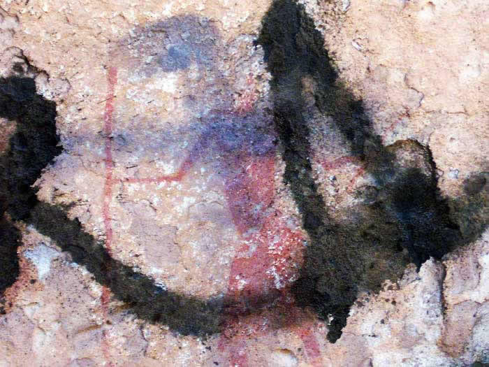 a prehistoric art painting from Acacus vandalised with graffiti