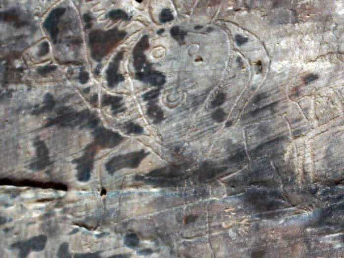 a prehistoric art painting from Acacus vandalised with graffiti