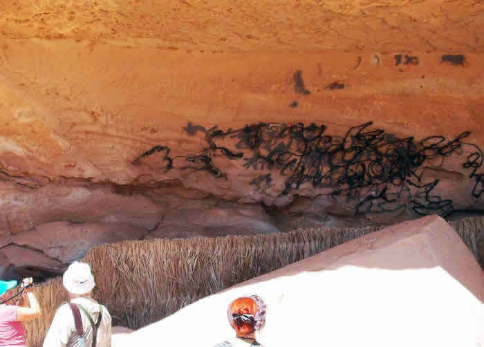 vandalised rock art site in Awiss