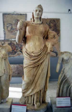 Cyrenaican Goddess Isis holding a child