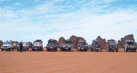 a group of cars in the desert