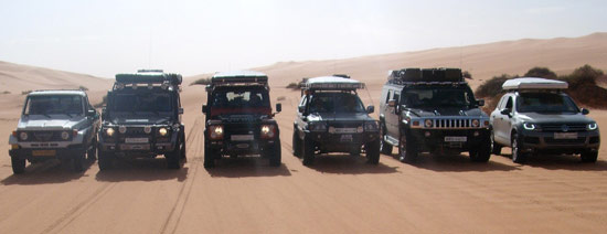 group of desert cars in the sahara