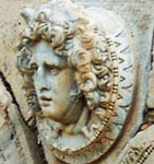 Medusa or gorgon's head looking left