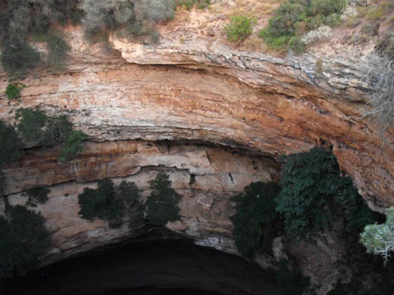 a big massive hole in the ground  near Cyrene at Hajyre