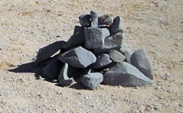 Newer stone pyramid road markers in the desert