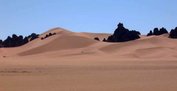 awiss sand dunes and rock formations inbetween