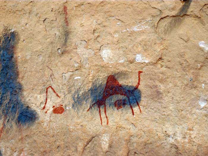 a prehistoric art painting from Acacus vandalised with graffiti