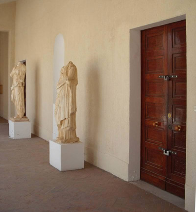 statues in the hall by the doors