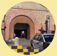 photo of red castle museum with police car outside