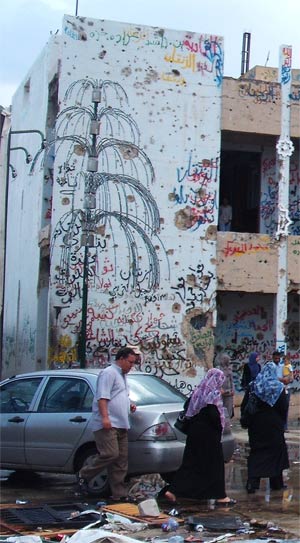 gaddafi's house covered in grafitti