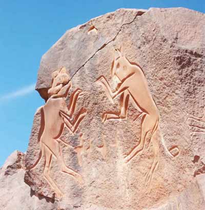 prehistoric engraving of two cats fighting at Matkhandoush