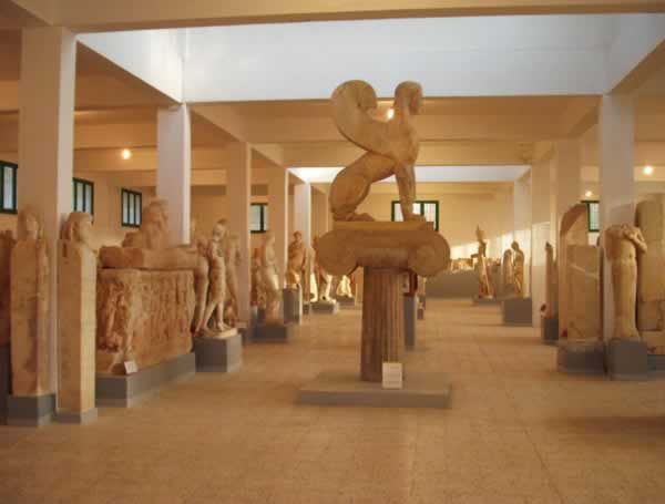 A massive collection of statues and sculptures from Cyrene Museum, including a giant sphinx in the middle of the room.