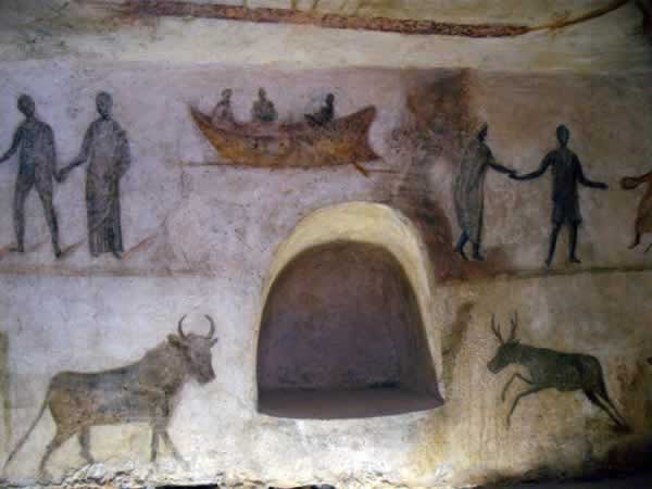 wall paintings from the tom, humans and animals