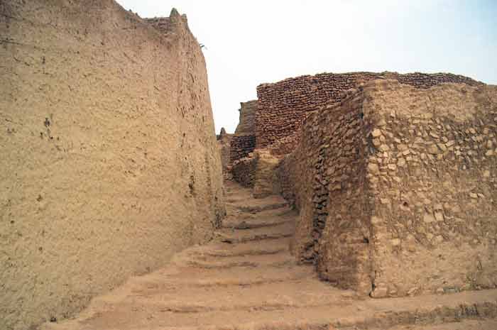 another street view of Ghat, with stairs going up the road