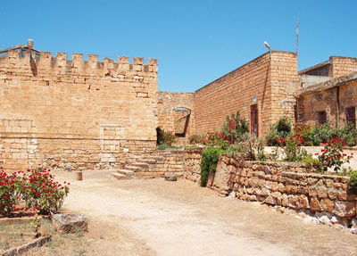 qasr libya side view with the garden on the right