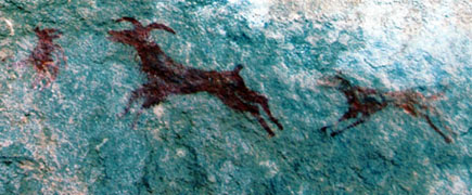 cave painting of animals running, in wadi tashwinat