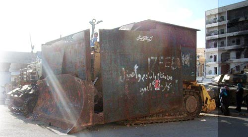 bulldozer shielded with metal sheets