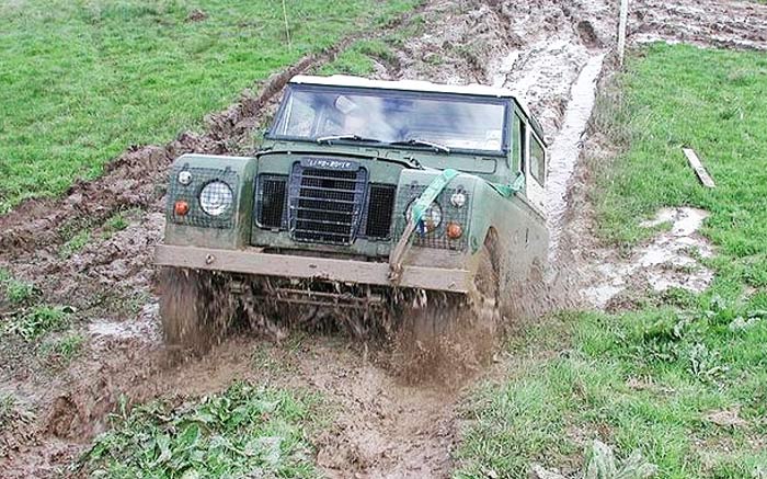 a landrover through wet mud